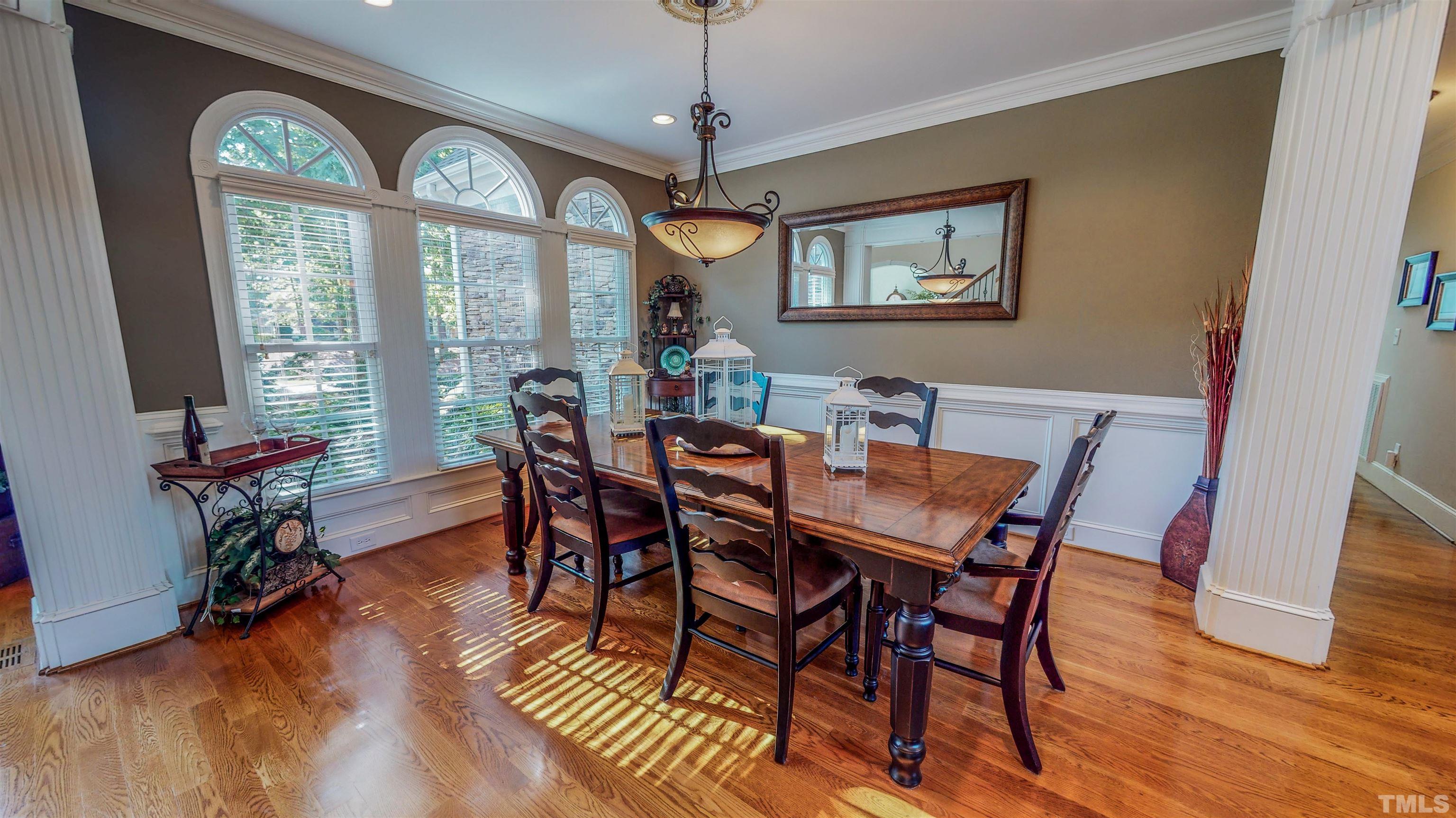 102 Continental Drive Durham, NC 27712 - Photo 64 of 86 a view of a dining room with furniture window and wooden floor