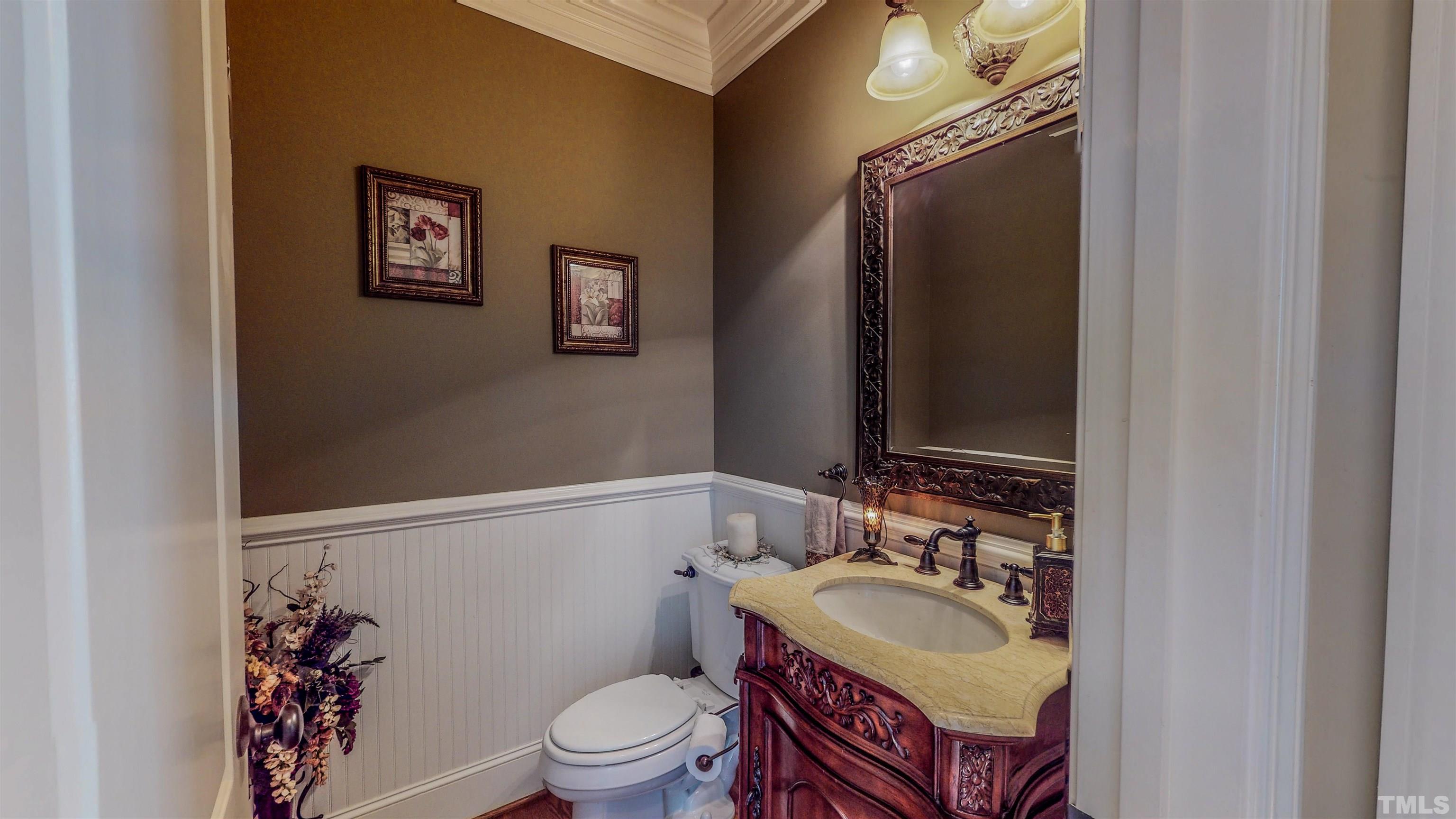 102 Continental Drive Durham, NC 27712 - Photo 66 of 86 a bathroom with a sink toilet and mirror