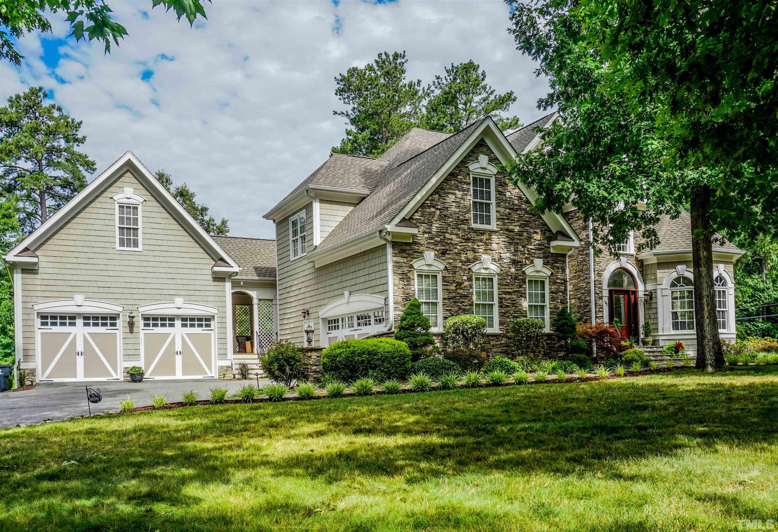 102 Continental Drive Durham, NC 27712 - Photo 86 of 86 a view of a house with a big yard plants and large trees