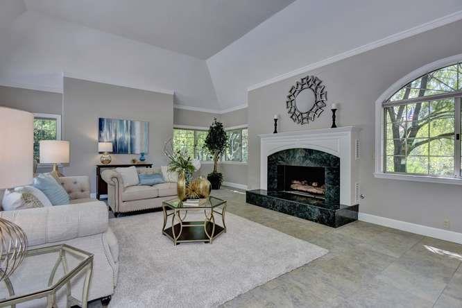 8380 Burchell Road Gilroy, CA 95020 - Photo 11 of 40 a living room with furniture and a fireplace