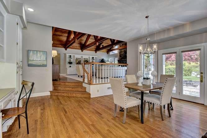 8380 Burchell Road Gilroy, CA 95020 - Photo 16 of 40 a dining room with furniture window and wooden floor