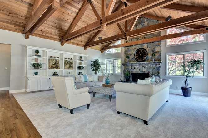 8380 Burchell Road Gilroy, CA 95020 - Photo 17 of 40 a living room with furniture and a fireplace