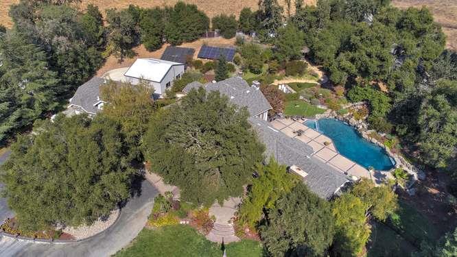 8380 Burchell Road Gilroy, CA 95020 - Photo 2 of 40 an aerial view of residential house with outdoor space and trees all around