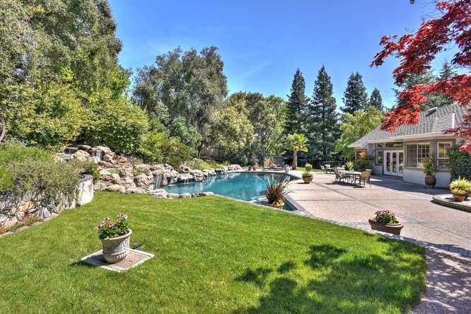 8380 Burchell Road Gilroy, CA 95020 - Photo 37 of 40 a swimming pool with outdoor seating and yard