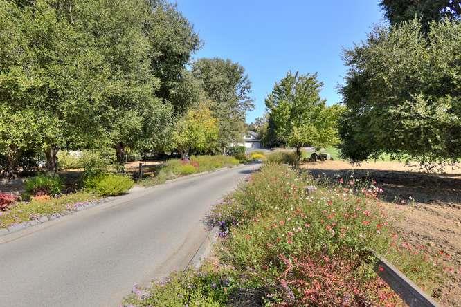 8380 Burchell Road Gilroy, CA 95020 - Photo 4 of 40 a view of a lake with houses