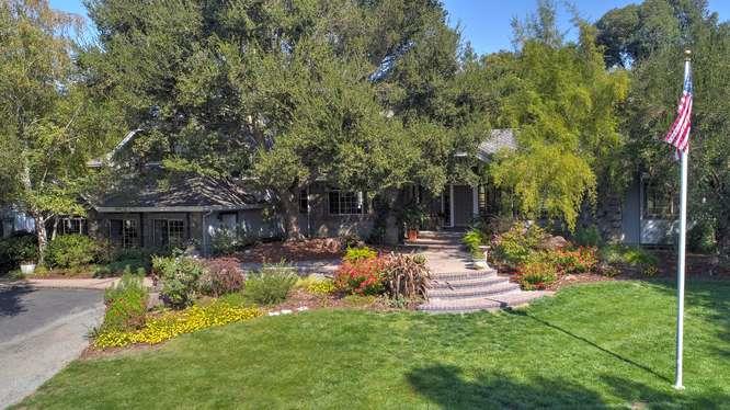 8380 Burchell Road Gilroy, CA 95020 - Photo 6 of 40 a view of a house with backyard and sitting area
