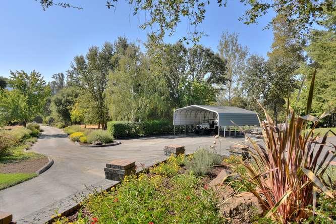 8380 Burchell Road Gilroy, CA 95020 - Photo 8 of 40 a view of a garden with a patio