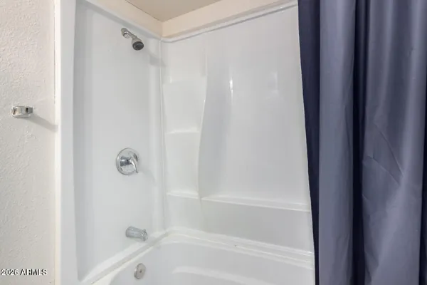 a bathroom with a bathtub