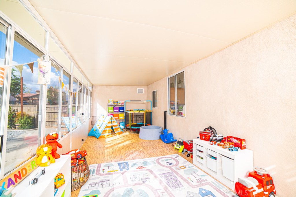 17801 Morning Rock Circle Riverside, CA 92503 - Photo 10 of 18 a bed room with a bed and a couch