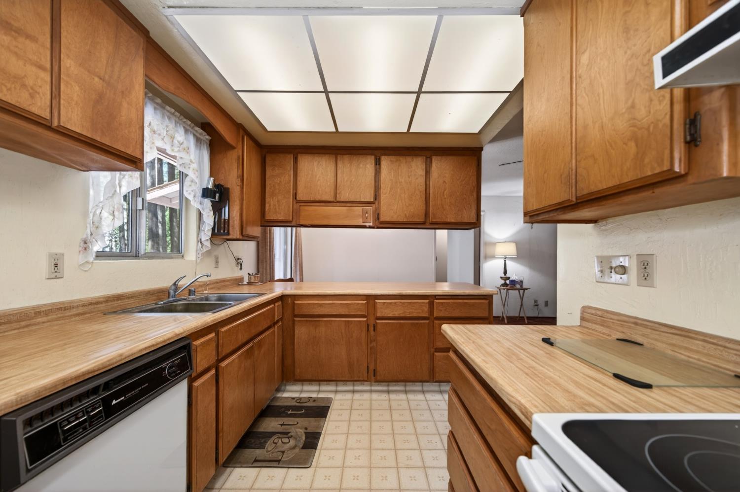 20191 Kit Court Volcano, CA 95689 - Photo 29 of 54 a kitchen that has a sink and a stove