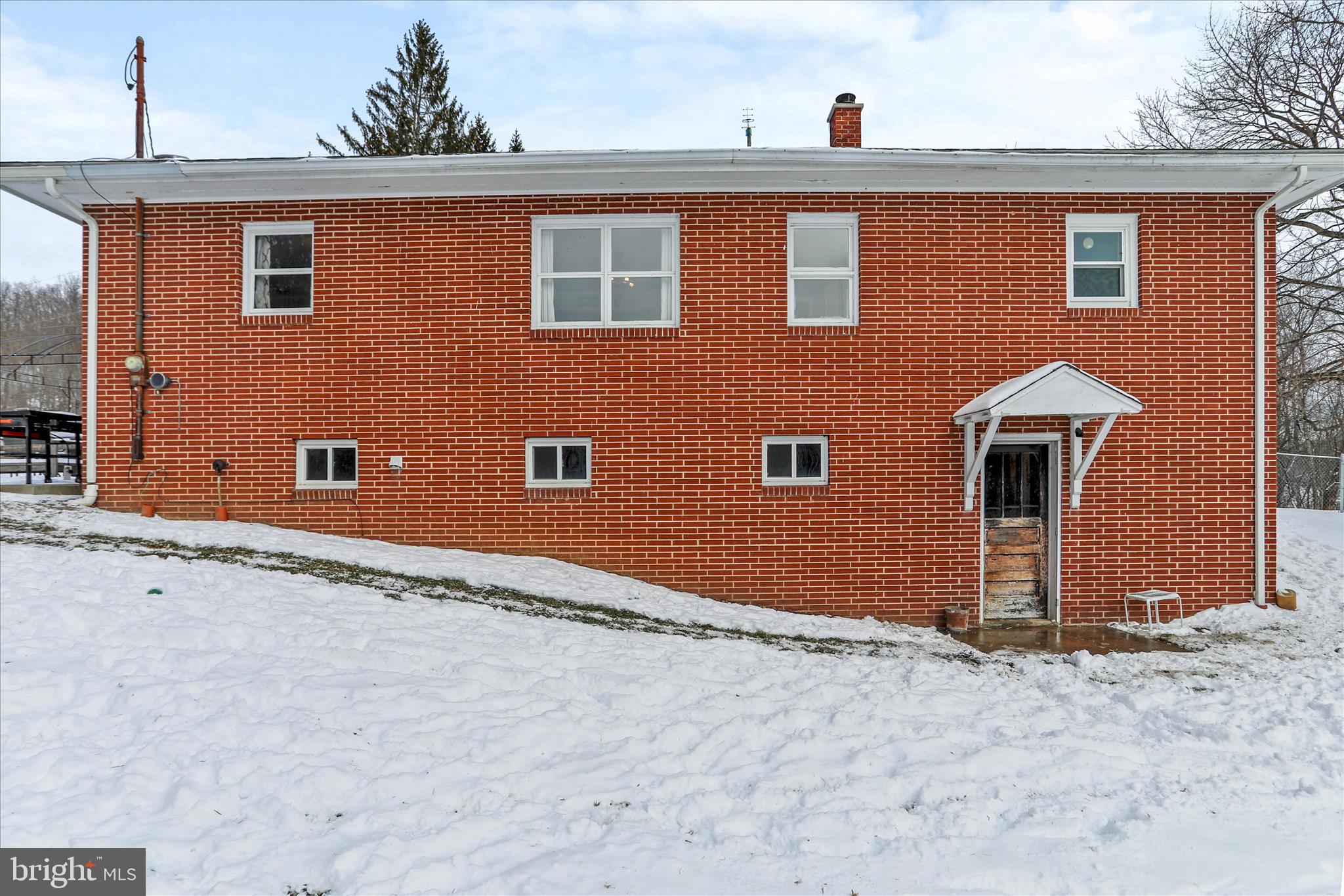 107 Shade Hollow Road Grantsville, MD 21536 - Photo 33 of 38 Walk out to back yard, pasture/garden and stream