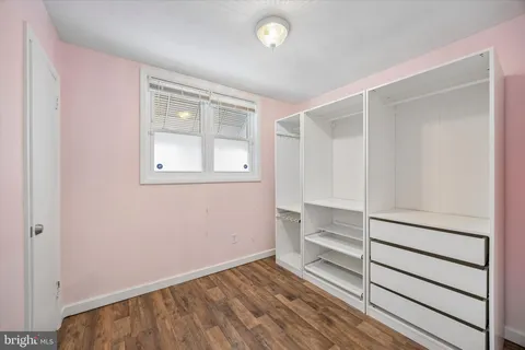 a view of an empty walk in closet