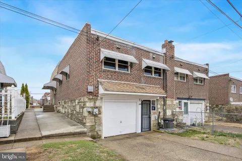 a front view of a house with entertaining space