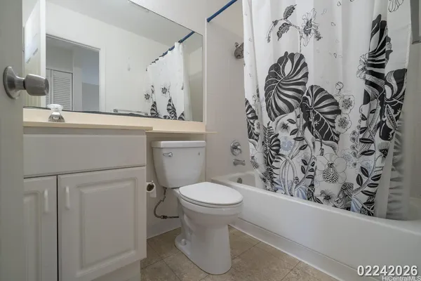 a bathroom with a toilet and a sink