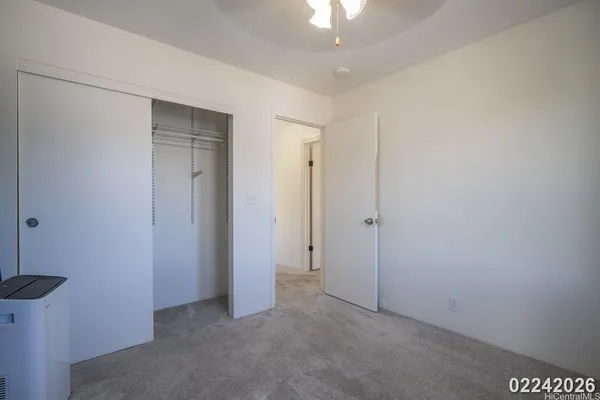 an empty room with a bathroom