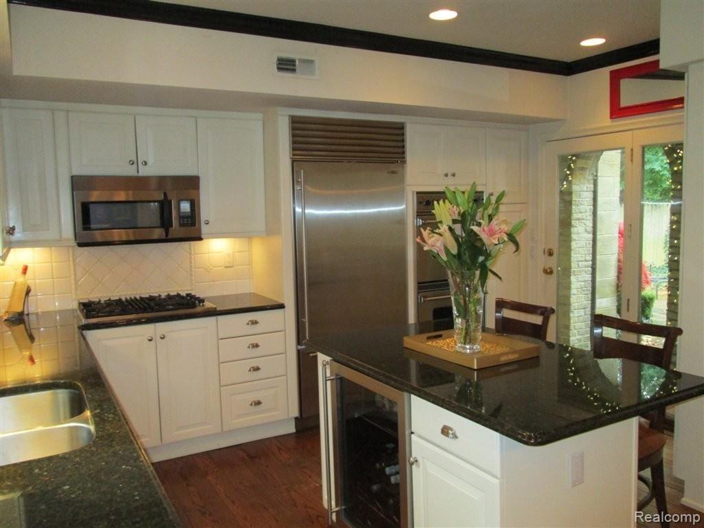 211 Aspen Road Birmingham, MI 48009 - Photo 10 of 22 Kitchen With Doors To Patio