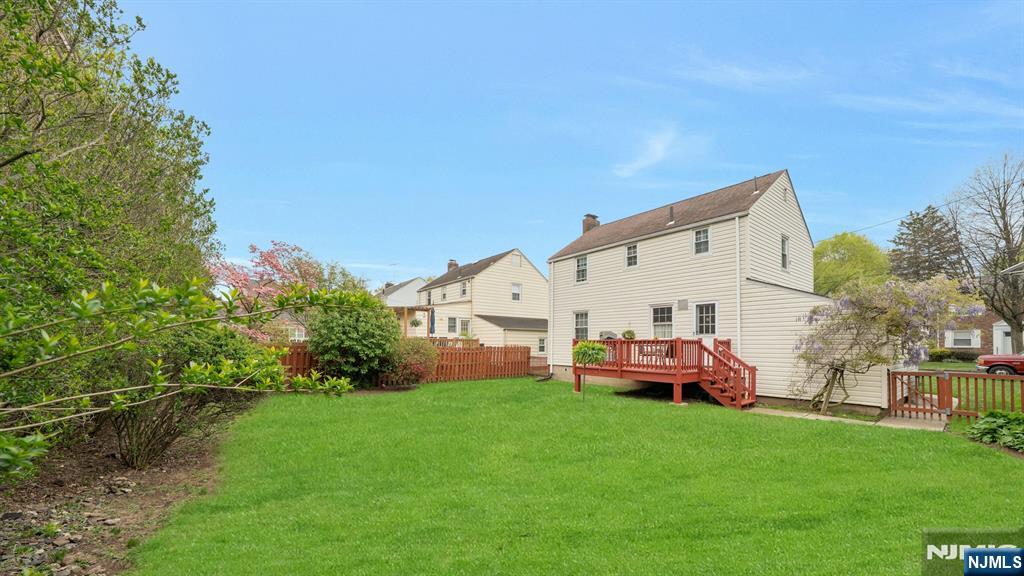 17 Brookdale Road Bloomfield, NJ 07003 - Photo 27 of 27 a front view of house with garden