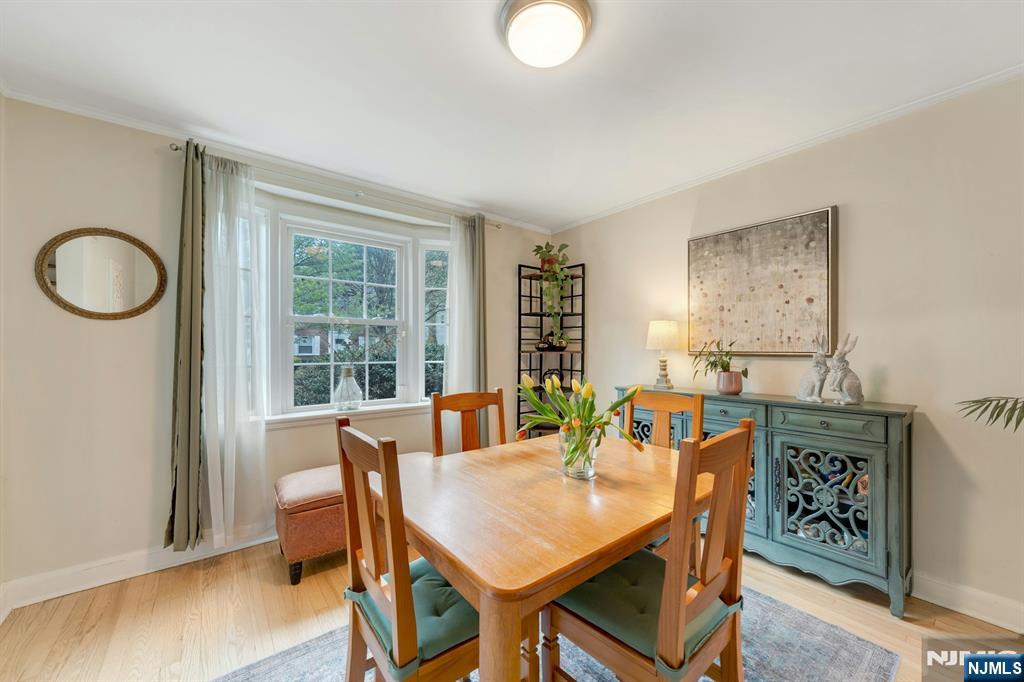 17 Brookdale Road Bloomfield, NJ 07003 - Photo 8 of 27 a view of a dining room with furniture window and wooden floor
