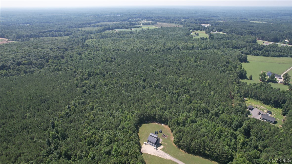 Tbd Tranquility Lane Sutherland, VA 23885 - Photo 15 of 35 an aerial view of a house with a yard and mountain view in back