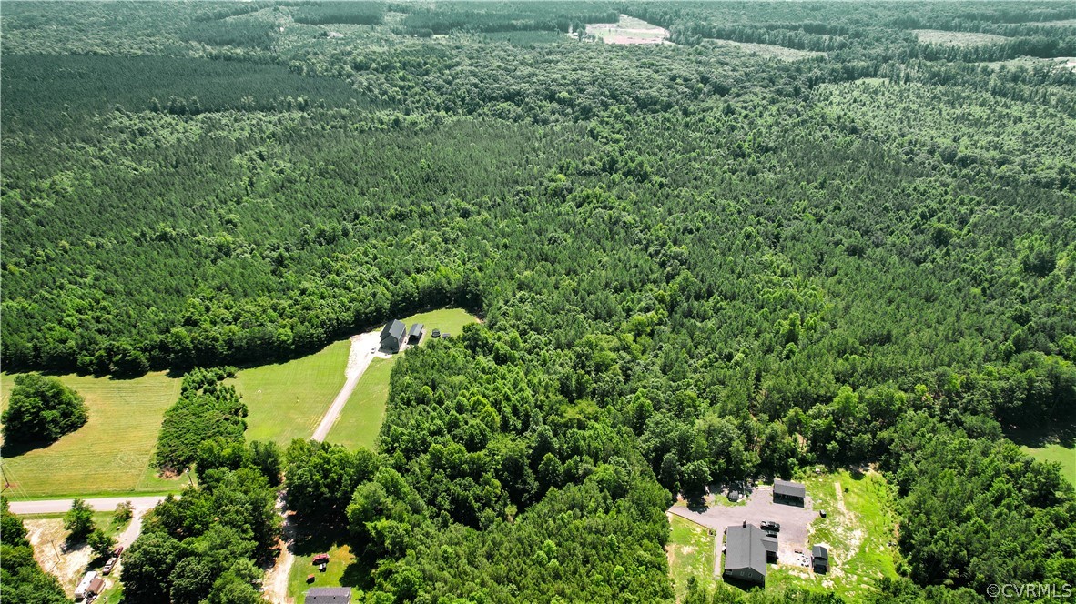 Tbd Tranquility Lane Sutherland, VA 23885 - Photo 3 of 35 an aerial view of residential house with outdoor space and trees all around