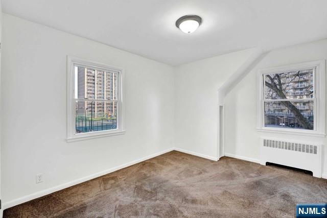 1010 Ponsi Street, Unit 2 Fort Lee, NJ 07024 - Photo 10 of 13 an empty room with a window