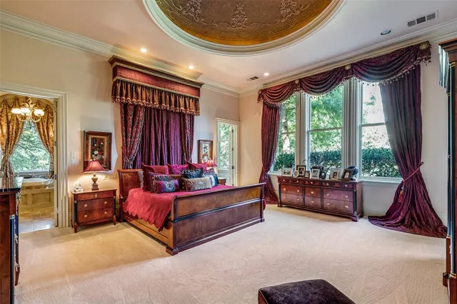 a bed room with a bed and a couch