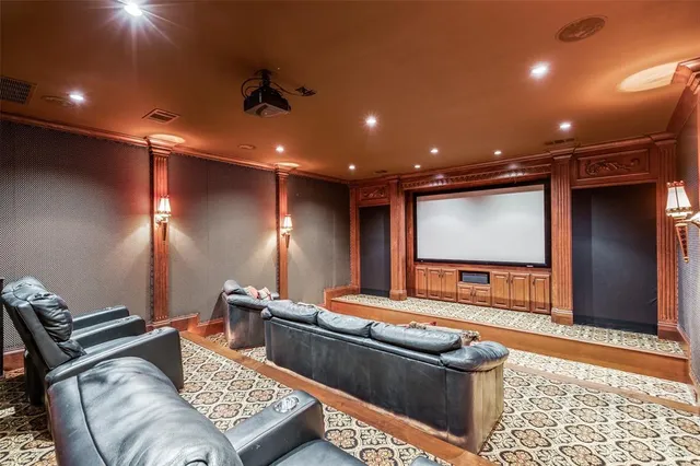 a bed room with a bed and a chandelier