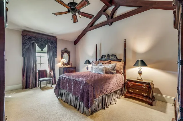 a bathroom with a granite countertop sink a mirror and shower