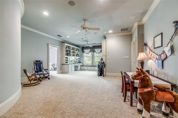 a building outdoor space with patio furniture and glass door