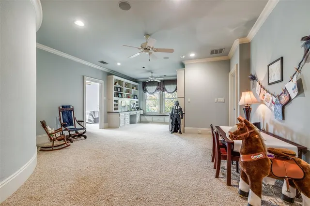 a building outdoor space with patio furniture and glass door