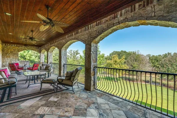 a view of a swimming pool with a yard
