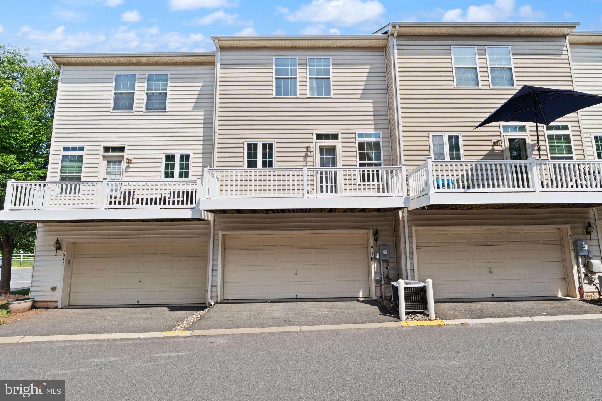 7015 Trek Way Gainesville, VA 20155 - Photo 3 of 56 2-car garage parking