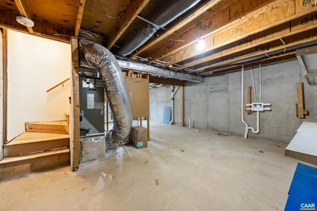 a view of empty room with wooden walls