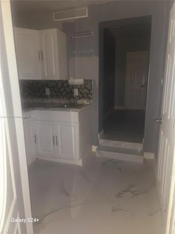 a bathroom with a bathtub