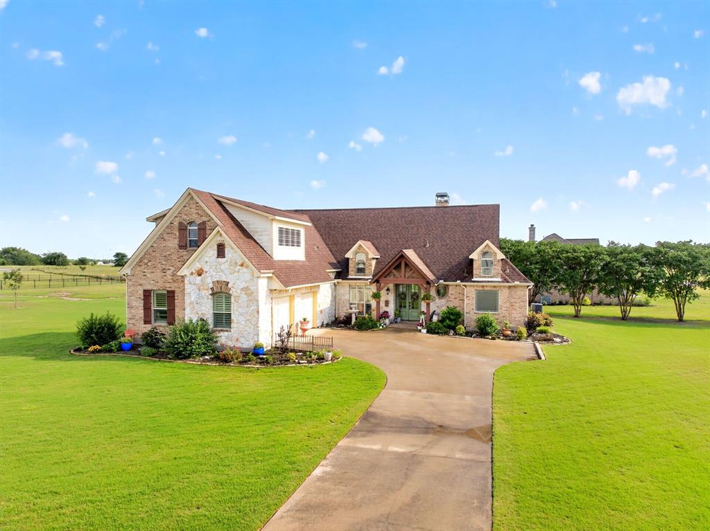 1399 Canyon Lake Road Wills Point, TX 75169 - Photo 2 of 37 a front view of house with yard and green space
