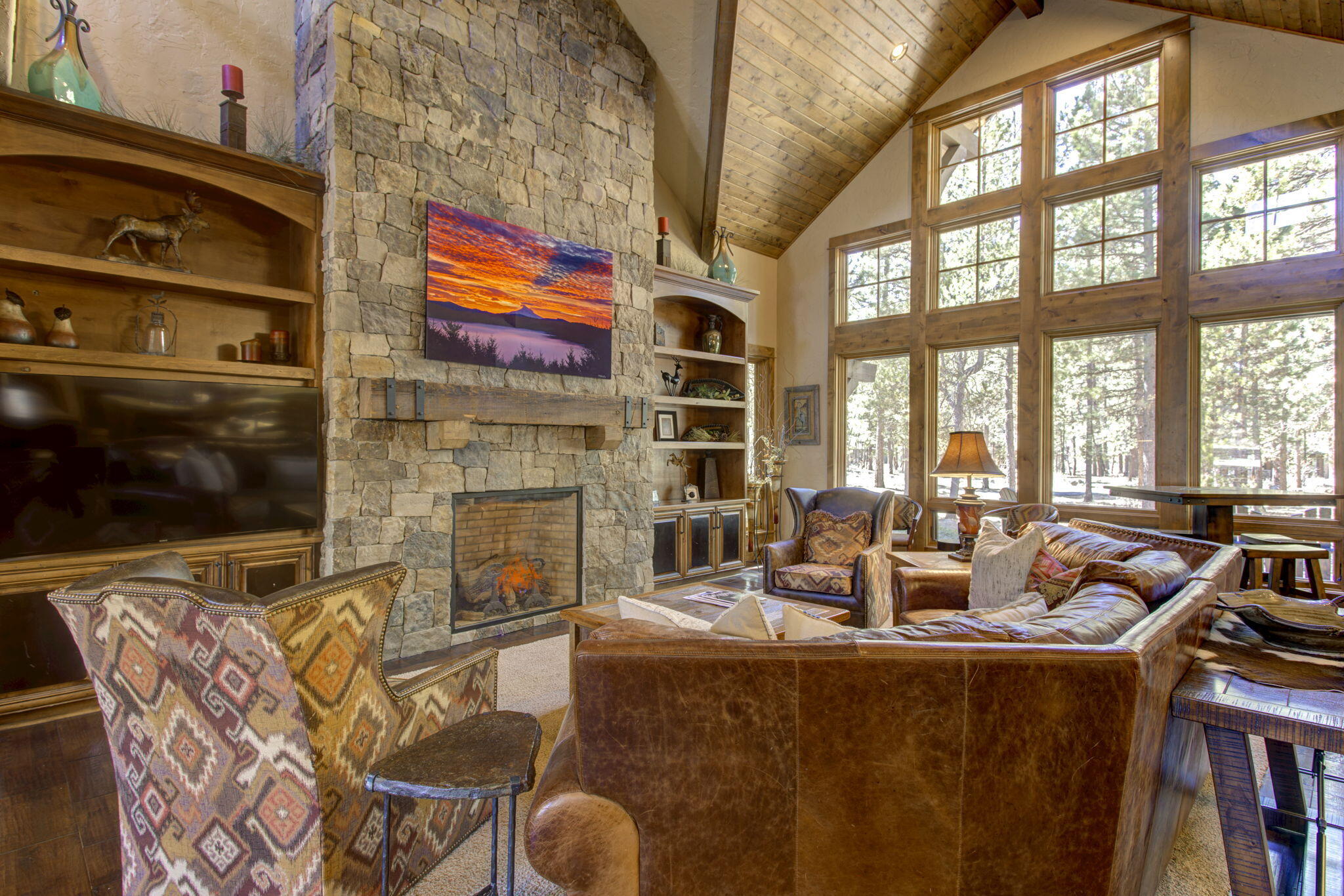 56184 Sable Rock Loop Bend, OR 97707 - Photo 11 of 72 Great room design with floor to ceiling wood windows