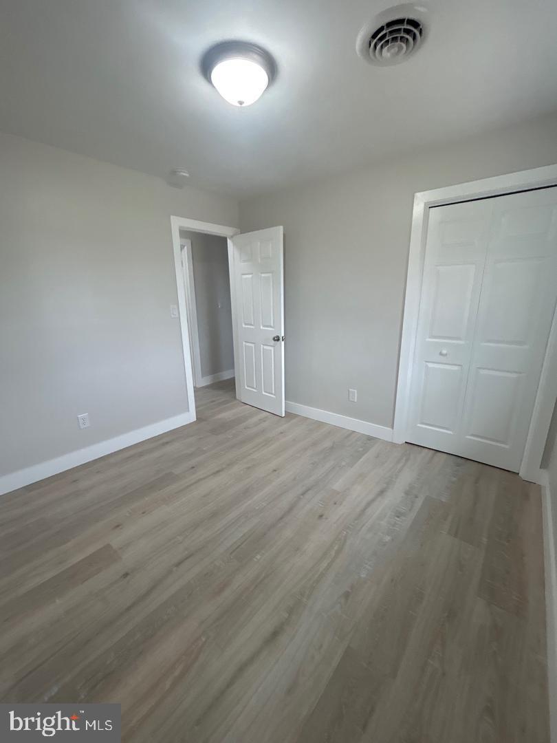 1133 Gayman Road Chambersburg, PA 17202 - Photo 19 of 33 an empty room with wooden floor