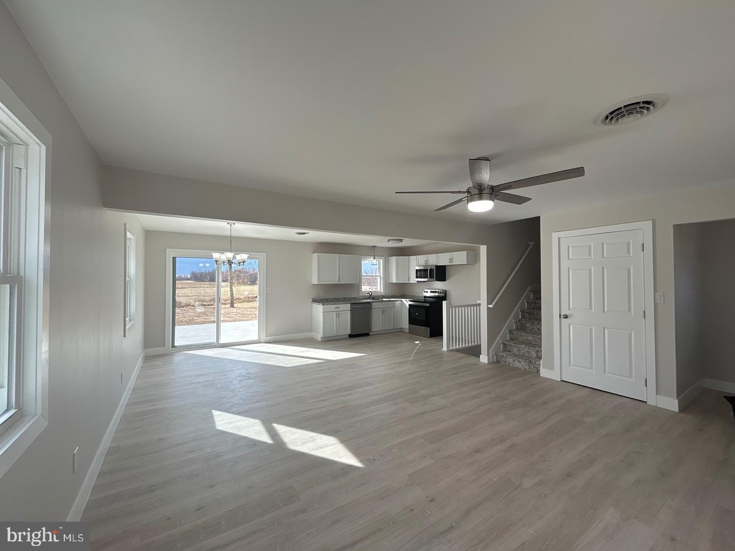 1133 Gayman Road Chambersburg, PA 17202 - Photo 4 of 33 a view of a livingroom with a furniture and window