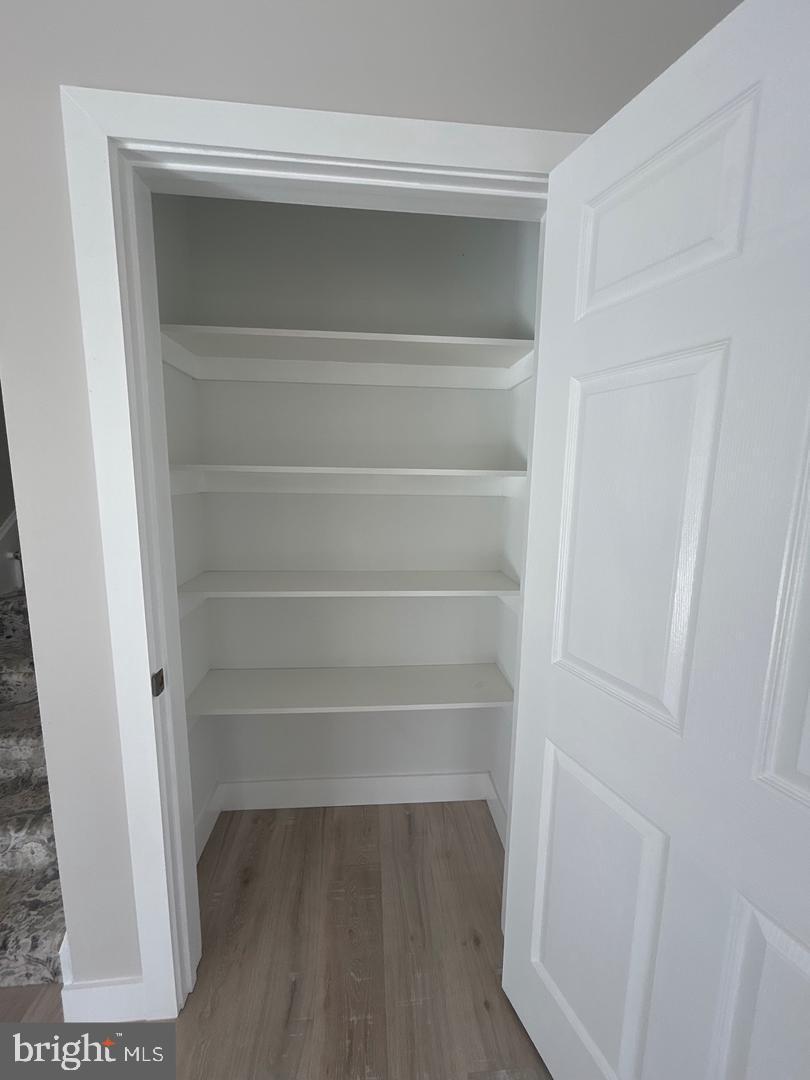 1133 Gayman Road Chambersburg, PA 17202 - Photo 5 of 33 a view of walk in closet with empty racks