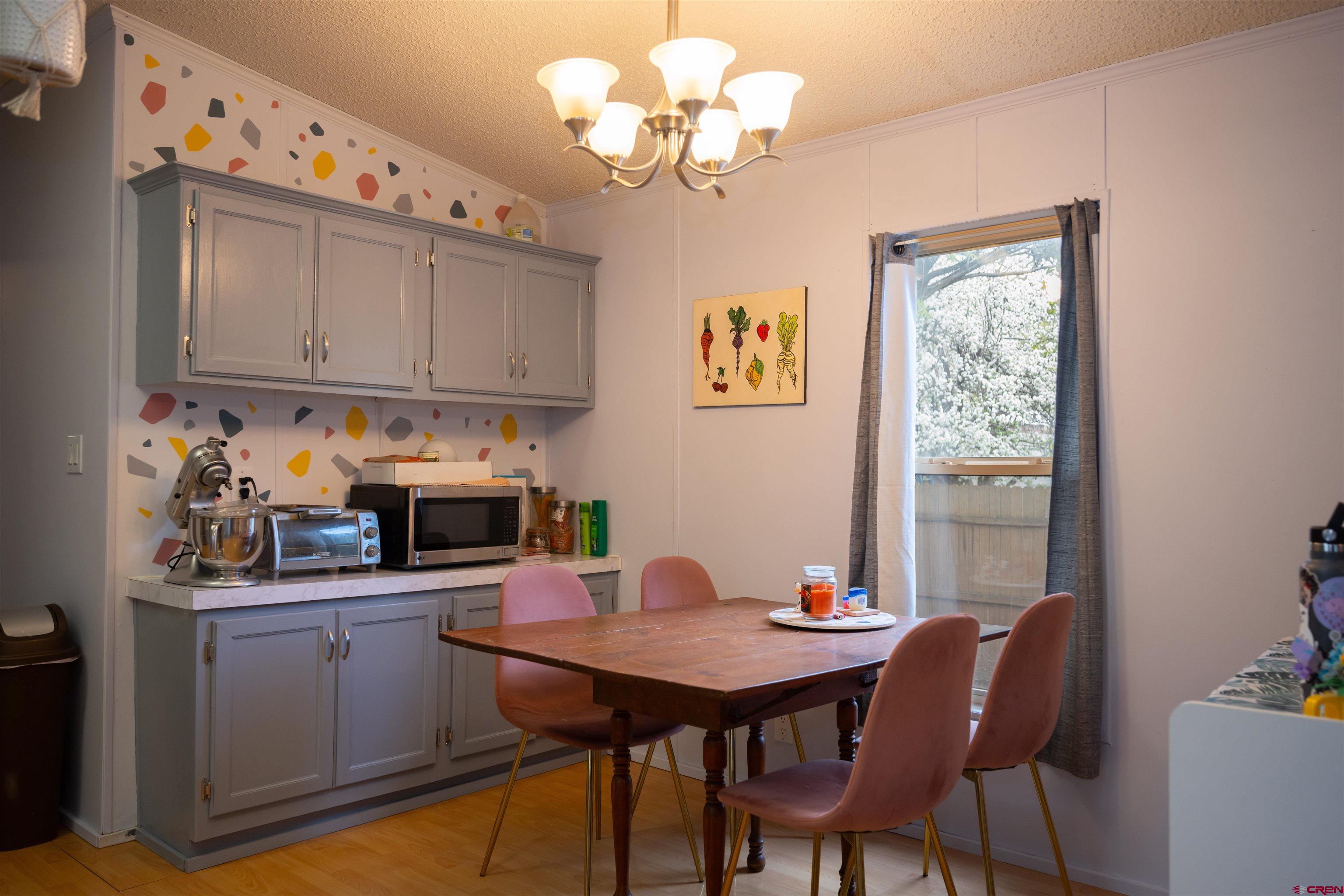 2 Mulberry Way Durango, CO 81301 - Photo 11 of 40 a view of a dining room with furniture and chandelier