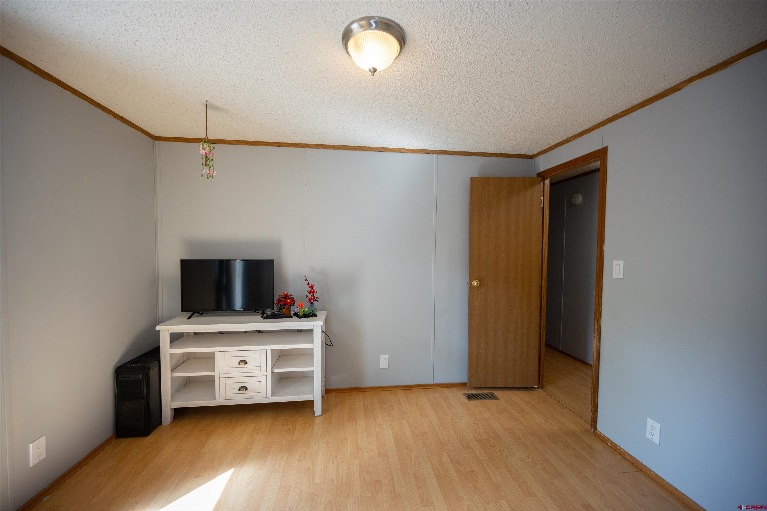 2 Mulberry Way Durango, CO 81301 - Photo 27 of 40 a view of a workspace with furniture and a flat screen tv