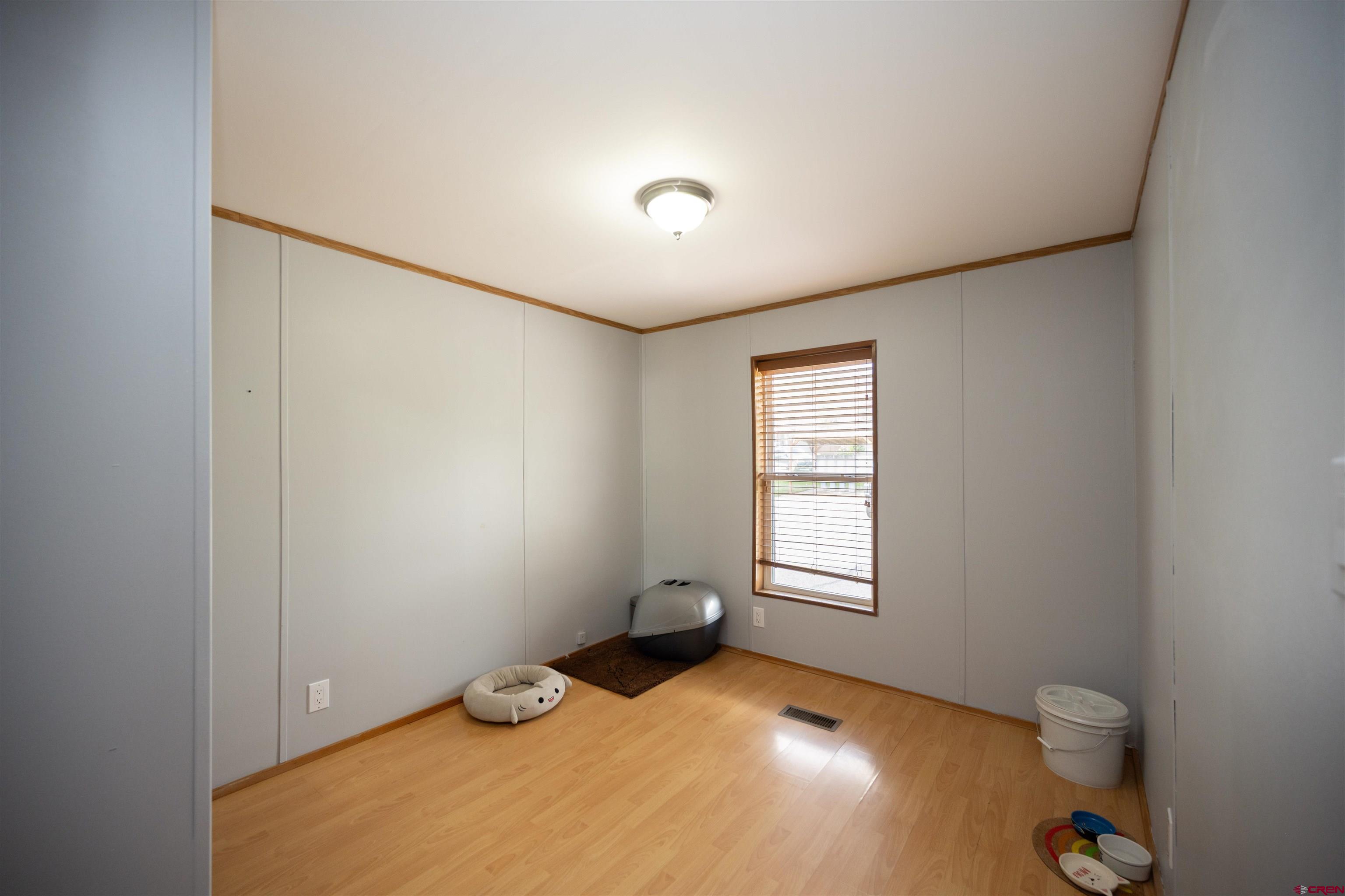 2 Mulberry Way Durango, CO 81301 - Photo 32 of 40 a bedroom with a bed and a window