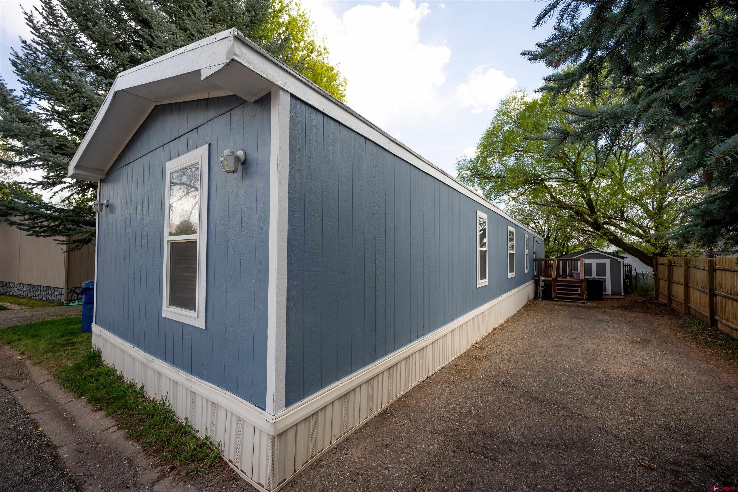 2 Mulberry Way Durango, CO 81301 - Photo 4 of 40 a view of a house with a yard