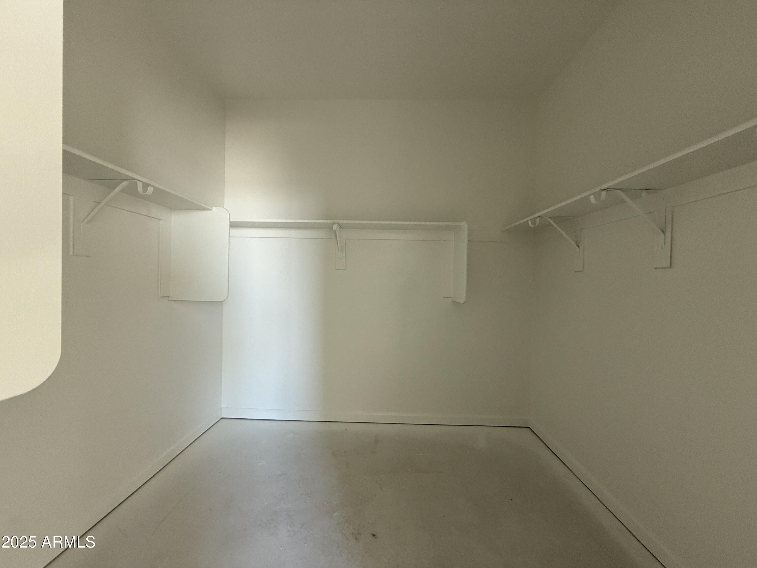 9627 West Tamarisk Avenue Tolleson, AZ 85353 - Photo 25 of 42 a view of an empty room