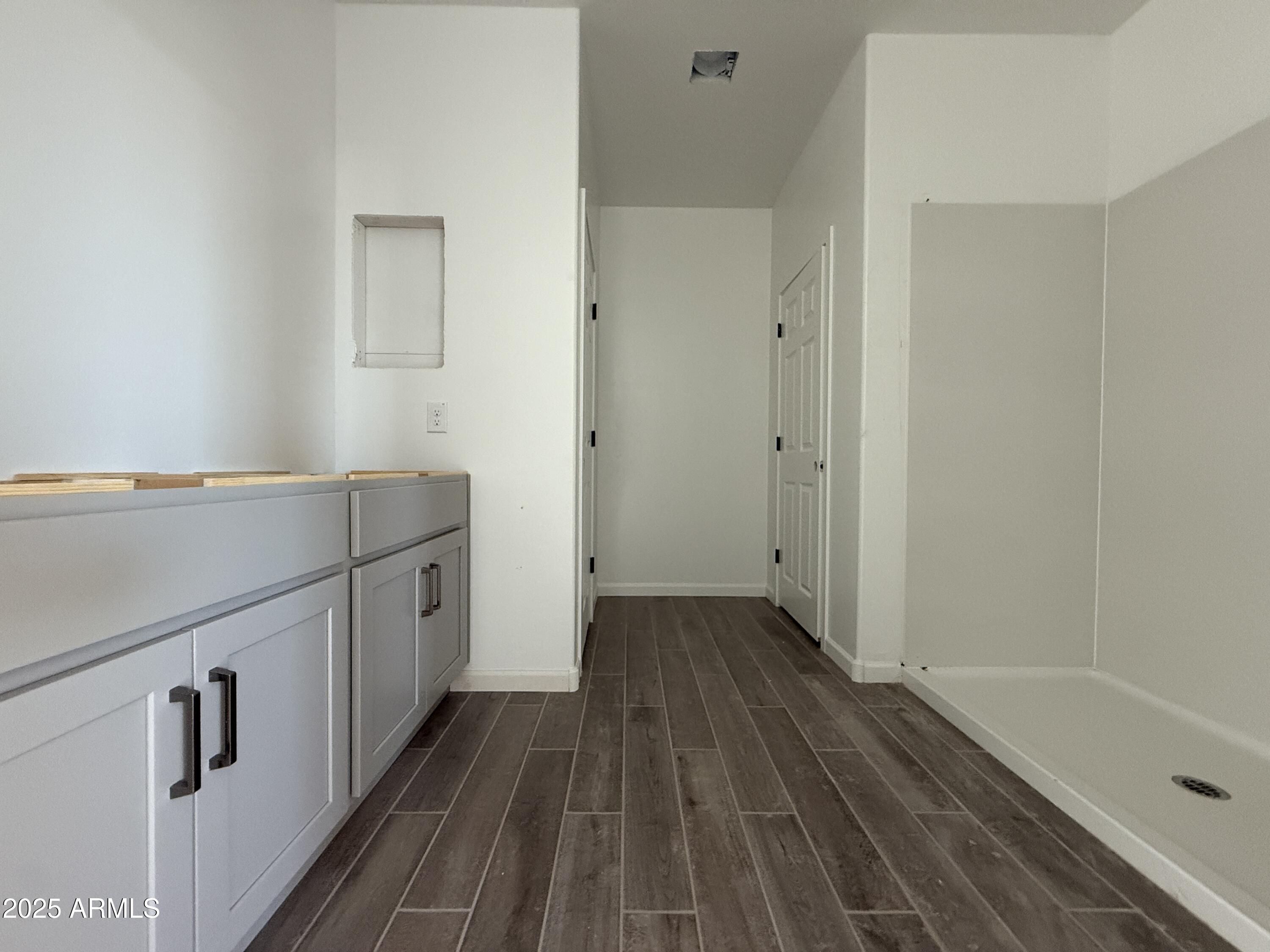 9627 West Tamarisk Avenue Tolleson, AZ 85353 - Photo 28 of 42 a view of wooden floor