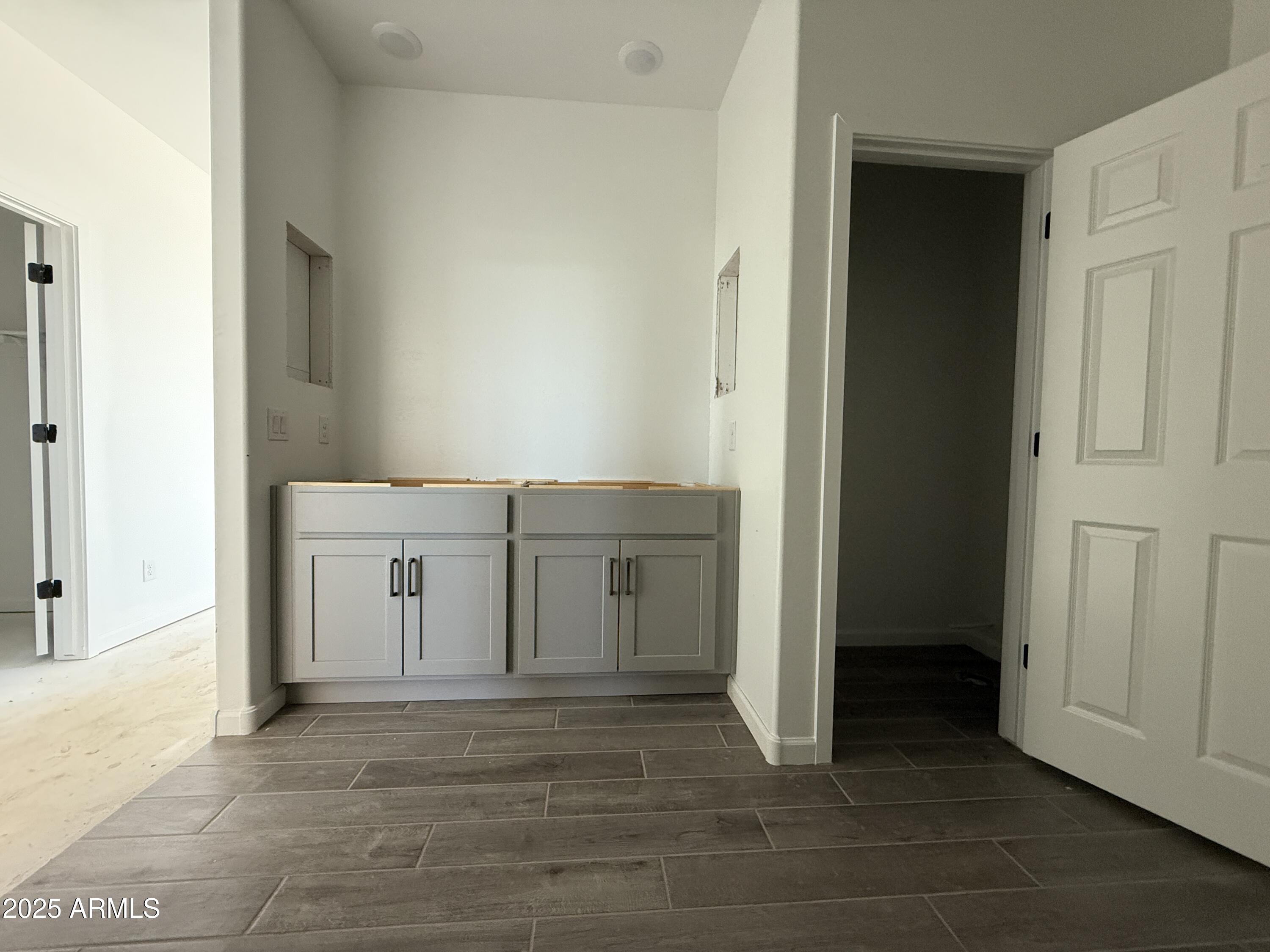 9627 West Tamarisk Avenue Tolleson, AZ 85353 - Photo 30 of 42 a view of a storage & utility room