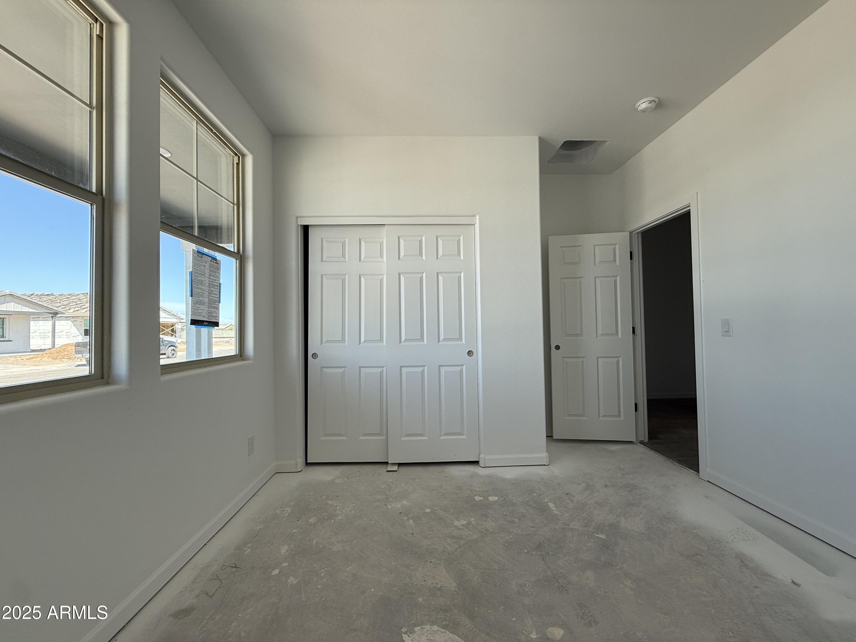 9627 West Tamarisk Avenue Tolleson, AZ 85353 - Photo 6 of 42 a view of an empty room