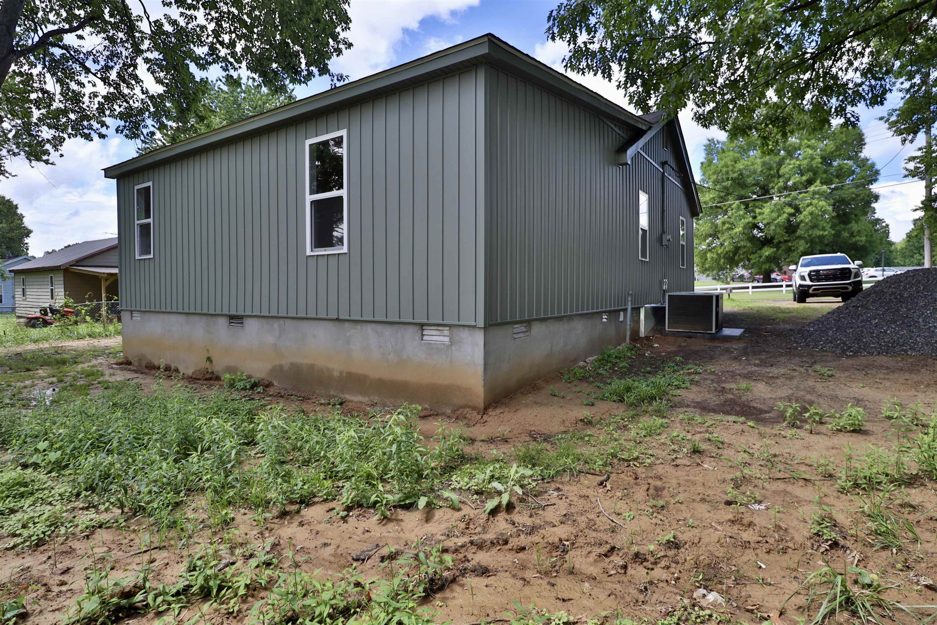 224 Kellar Avenue Ripley, TN 38063 - Photo 28 of 30 a backyard of a house with lots of green space