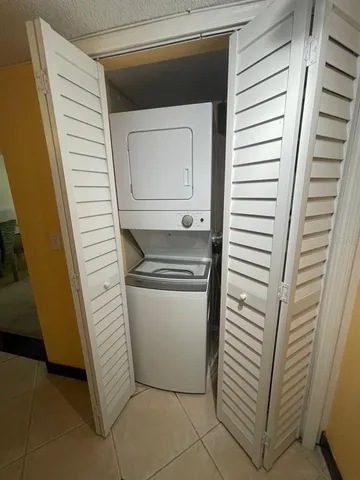 a utility room with washer and dryer