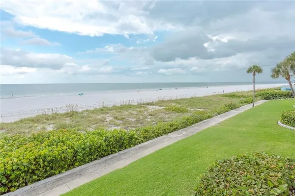 a view of a lake with a big yard